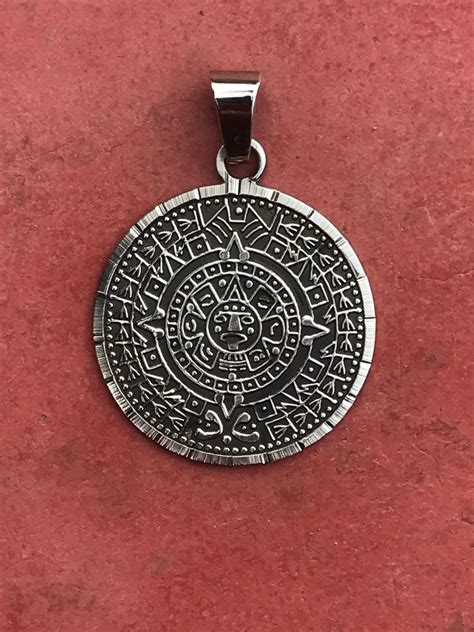 aztec calendar pendant